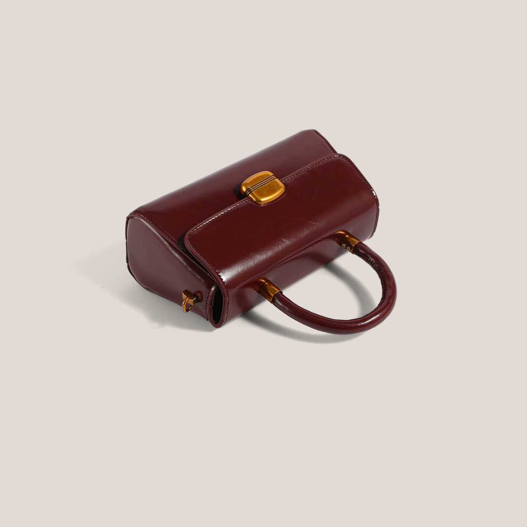 Bolso de mano brillante Mila